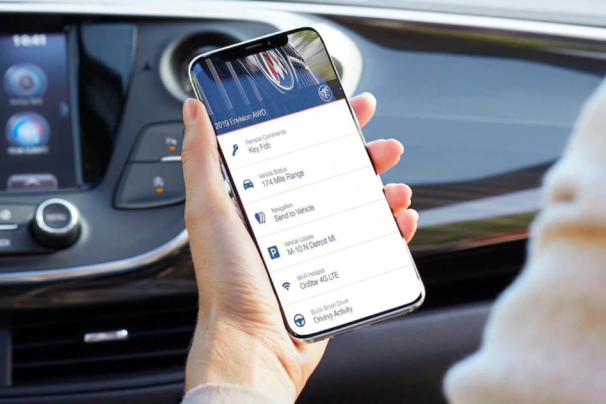 Buick, GMC mobile app on phone in user's hand